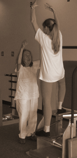 Romana Kryzanowska teaching pilates high chair